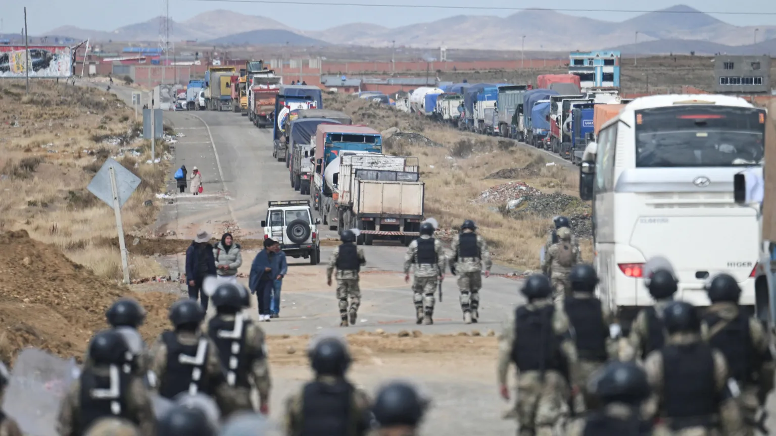 Bolivian minister's convoy ambushed while monitoring barricade removal