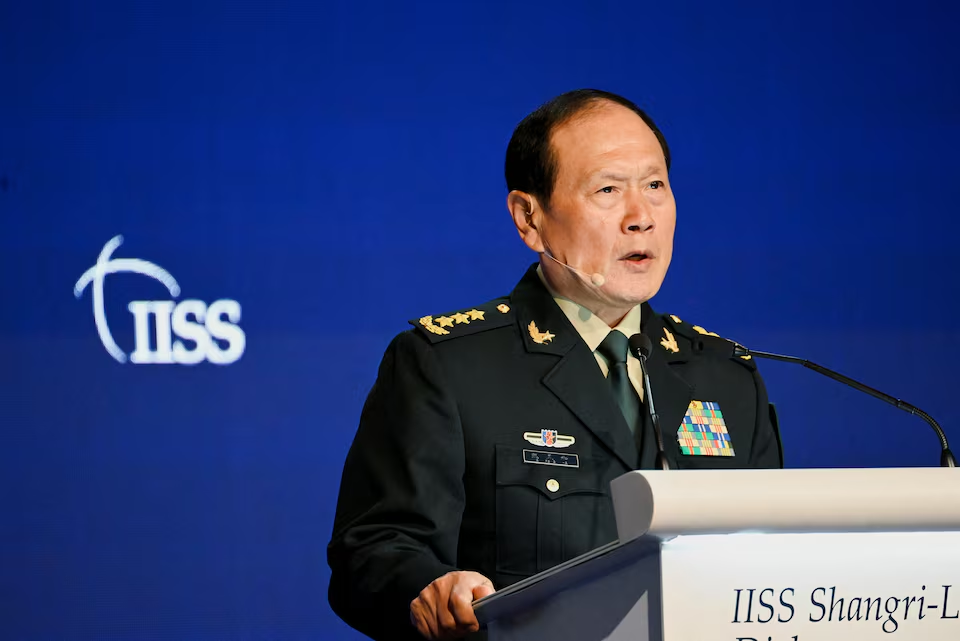 China gives suspended death sentence to former defense minister