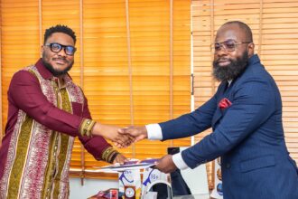 Jeffrey Naughty signs a brand ambassadorship with Robert & Sons.