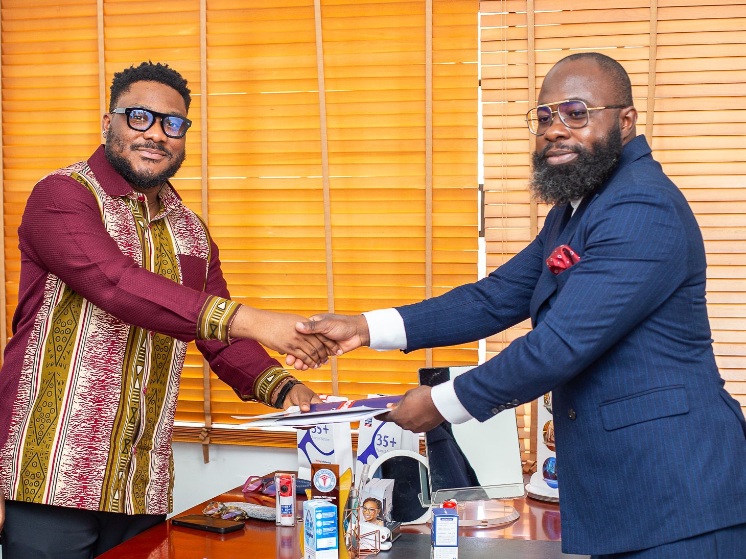 Jeffrey Naughty signs a brand ambassadorship with Robert & Sons.