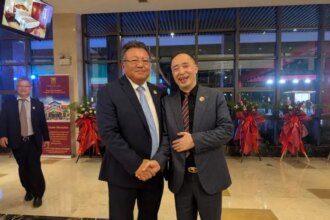 Tan Hong re-elected