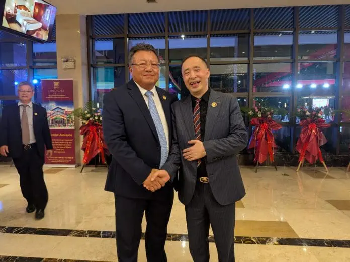 Tan Hong re-elected