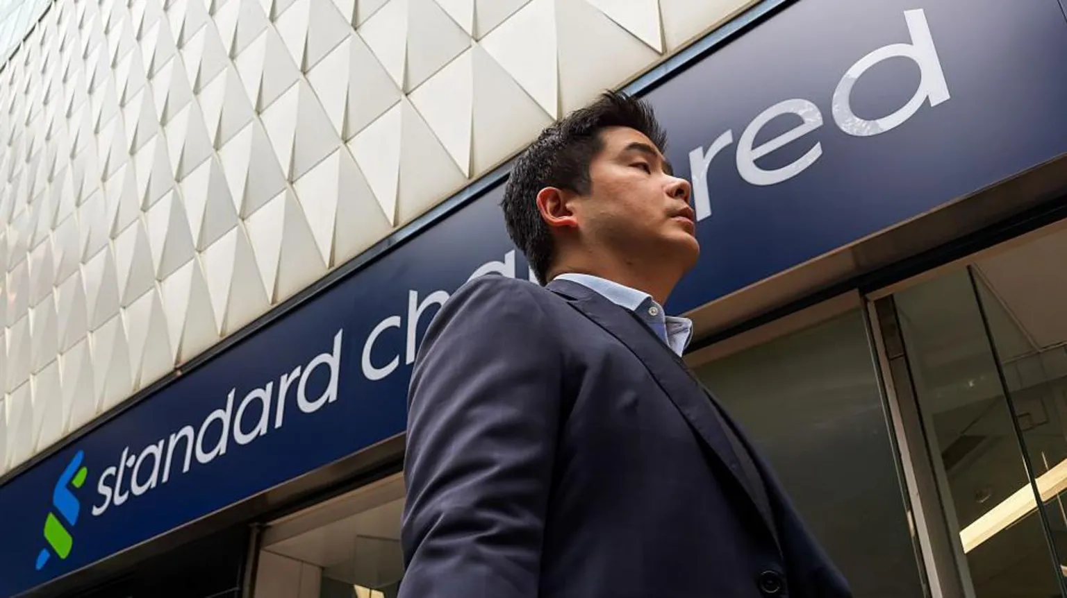 Standard Chartered cuts thousands of roles as use of AI increases