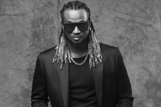 (Video) P Square singer Paul Okoye falls off stage during performance in Australia