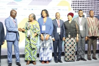 Haruna Iddrisu (2nd from left), Minister of Education, exchanging pleasantries with Dr Ida Opoku Mensah (3r from left), the conference chair. With them are some invited guests and participants in the conference. Picture: BENEDICT OBUOBI