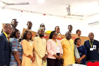 Jeq Foundation presents laptops to scholarship recipients