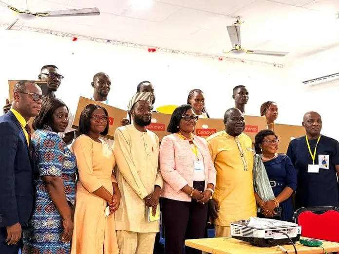 Jeq Foundation presents laptops to scholarship recipients